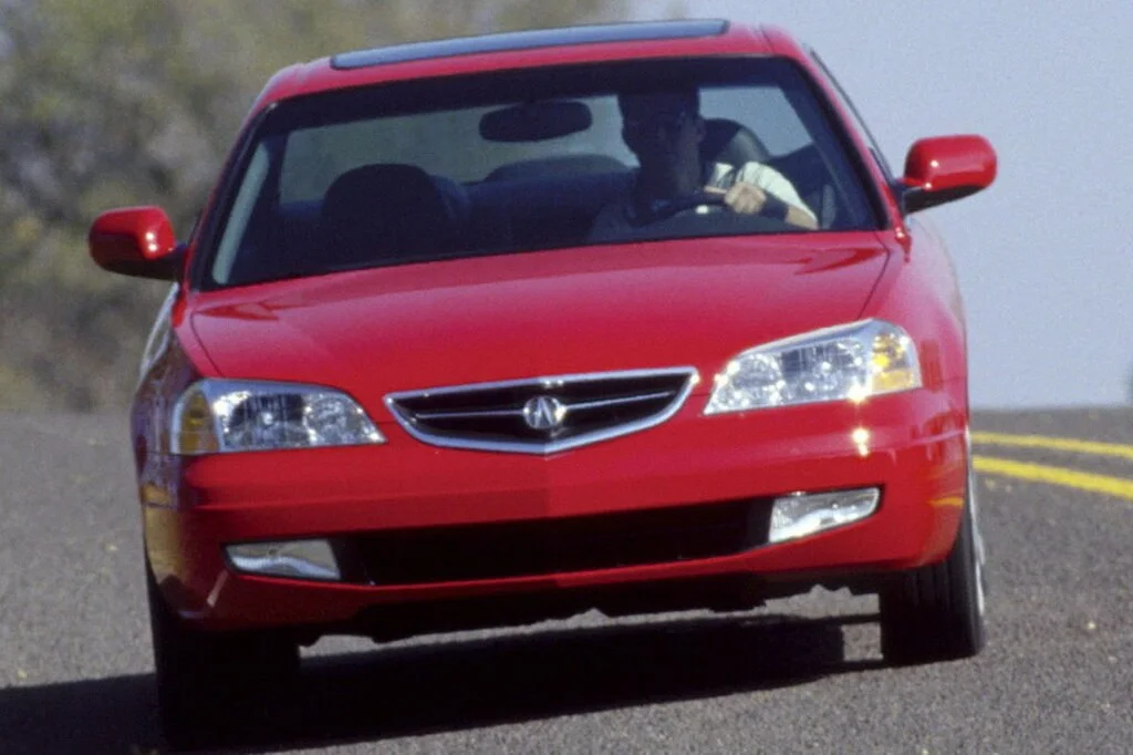 Фото Acura CL (2003) — вид спереди, фото 6. Три четверти спереди: видно и «лицо», и профиль разом Acura CL (2003) — вид спереди, фото 6