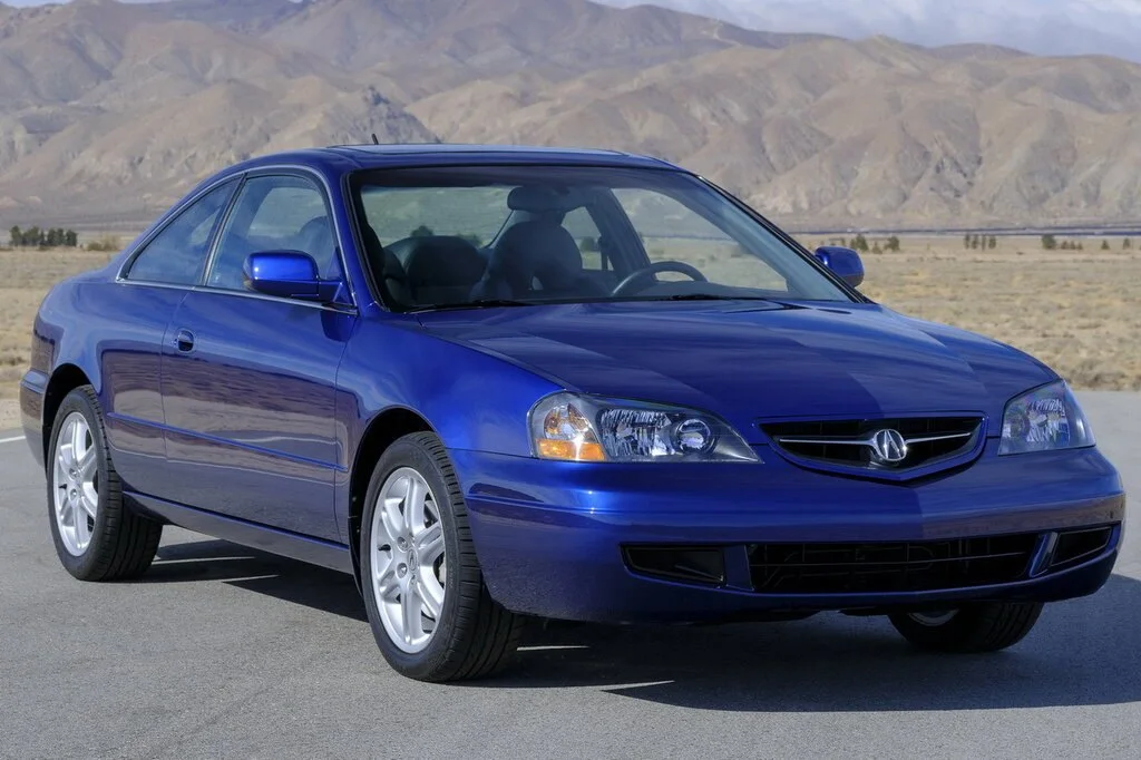 Фото Acura CL (2003) — вид спереди, фото 8. Передняя часть крупно: рисунок ходовых огней и воздухозаборники Acura CL (2003) — вид спереди, фото 8