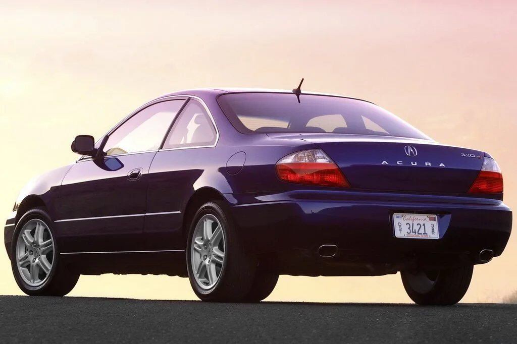 Фото Acura CL (2003) — вид сзади, фото 2. Задняя часть крупно: ширина кормы и выпускная система Acura CL (2003) — вид сзади, фото 2
