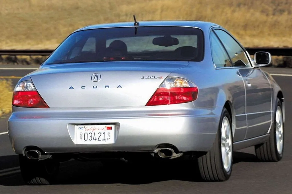 Фото Acura CL (2003) — вид сзади, фото 4. Корма: рисунок фонарей, бампер и оформление пятой двери Acura CL (2003) — вид сзади, фото 4