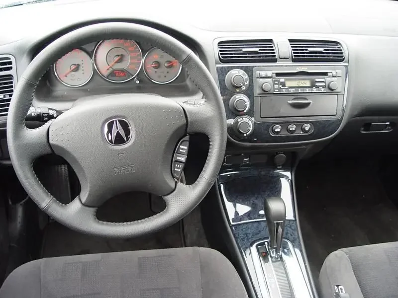 Фото Acura EL (2003) — передняя панель. Архитектура передней панели: экраны, дефлекторы и отделка Acura EL (2003) — передняя панель