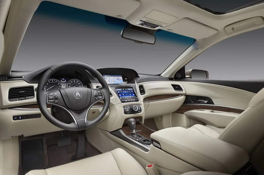 Фото Acura RLX (2017) — интерьер, фото 7. Общий план салона: панель, консоль и передние кресла Acura RLX (2017) — интерьер, фото 7