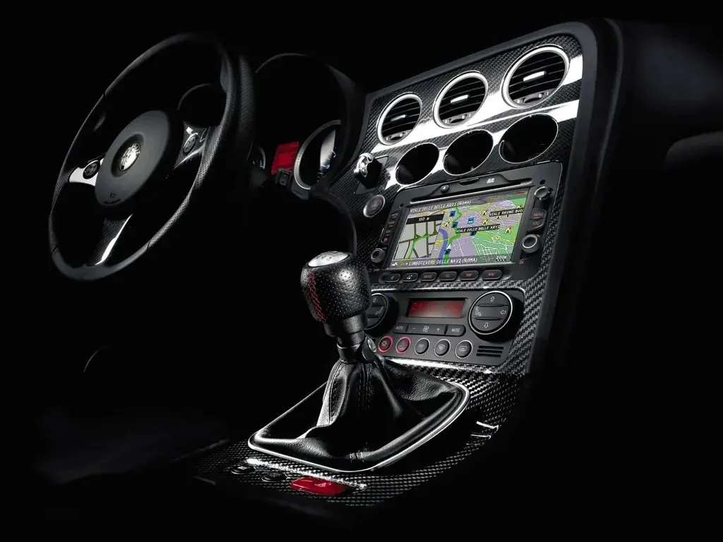 Фото Alfa Romeo 159 (2009) — селектор передач. Селектор передач и кнопки режимов движения Alfa Romeo 159 (2009) — селектор передач