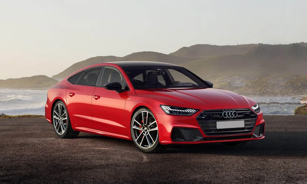 Фото Audi A7 Sportback — вид спереди, фото 5. Оптика, решётка и бампер — первое впечатление о модели. Рисунок ходовых огней — подпись модели, по нему её узнают в потоке Audi A7 Sportback — вид спереди, фото 5