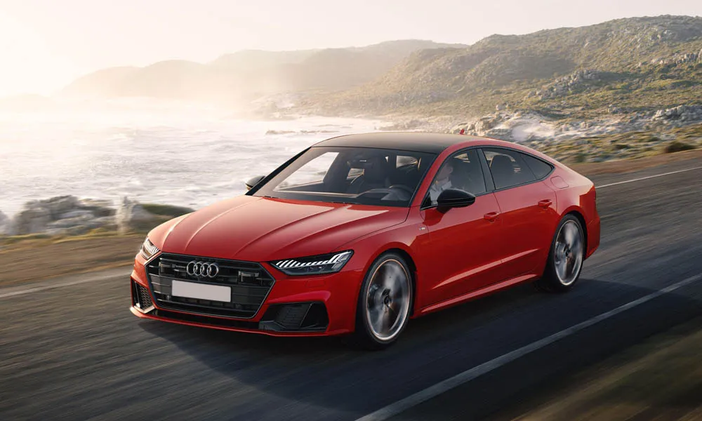Фото Audi A7 Sportback — вид спереди, фото 6. Анфас: пропорции капота, посадка кузова и графика ходовых огней. Дневные ходовые огни включаются автоматически с запуском Audi A7 Sportback — вид спереди, фото 6
