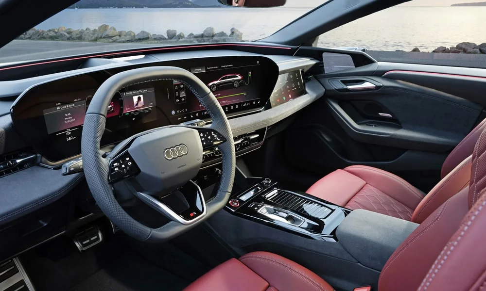Фото Audi S6 Avant e-tron (2024) — передняя панель. Компоновка экранов, дефлекторов и консоли. Минимум физических кнопок — ставка на экранное управление Audi S6 Avant e-tron (2024) — передняя панель