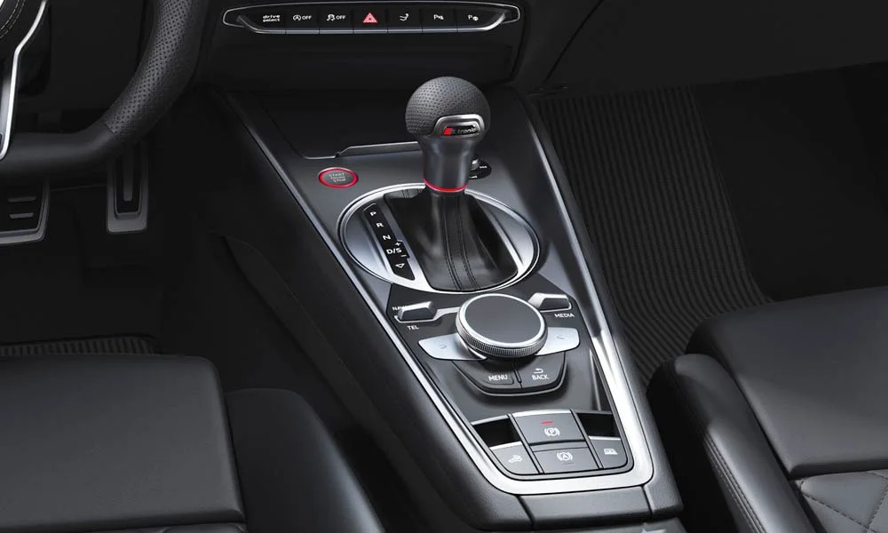 Фото Audi TTS — селектор коробки передач, фото 2. Управление коробкой: компактный селектор освобождает место на тоннеле. Режимы движения и электронный ручник собраны рядом с селектором Audi TTS — селектор коробки передач, фото 2