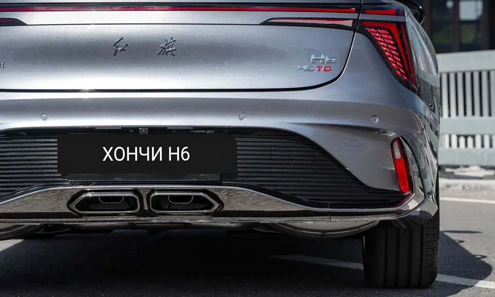 Фото Hongqi H6 (2024) — вид сзади, фото 4. Графика фонарей, бампер и оформление пятой двери. Насадки выхлопа или их имитация внизу бампера различают версии Hongqi H6 (2024) — вид сзади, фото 4