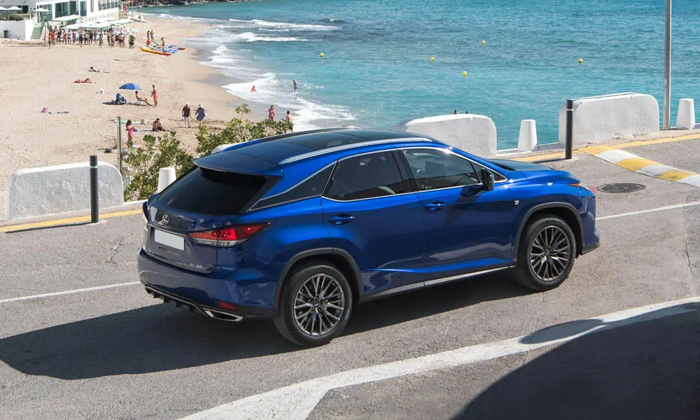 Фото Lexus RX 300 — вид сзади, фото 4. Линия крыши, стойки и задняя дверь в синем исполнении Lexus RX 300 — вид сзади, фото 4