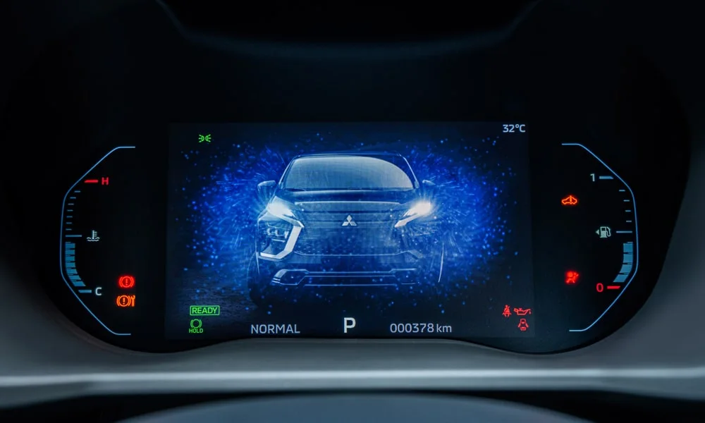 Фото Mitsubishi Xpander (2024) — экран мультимедиа. Интерфейс медиасистемы крупным планом. Быстрота отклика интерфейса важнее диагонали — оцените её на тест-драйве Mitsubishi Xpander (2024) — экран мультимедиа