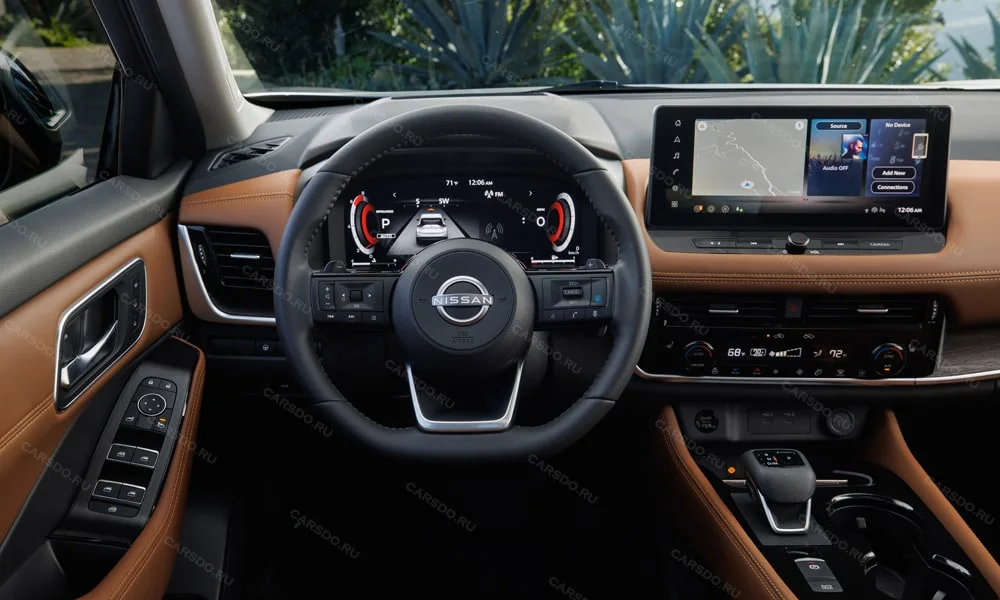 Фото Nissan X-Trail (2024) — передняя панель. Компоновка экранов, дефлекторов и консоли. Минимум физических кнопок — ставка на экранное управление Nissan X-Trail (2024) — передняя панель
