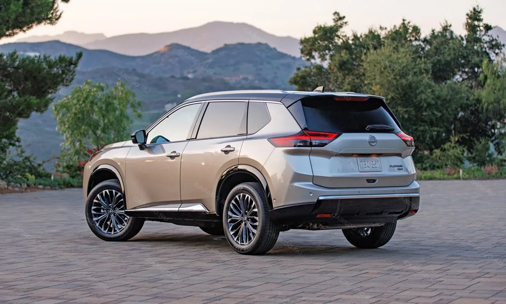 Фото Nissan X-Trail (2024) — вид сзади, фото 3. Графика фонарей, бампер и оформление пятой двери Nissan X-Trail (2024) — вид сзади, фото 3