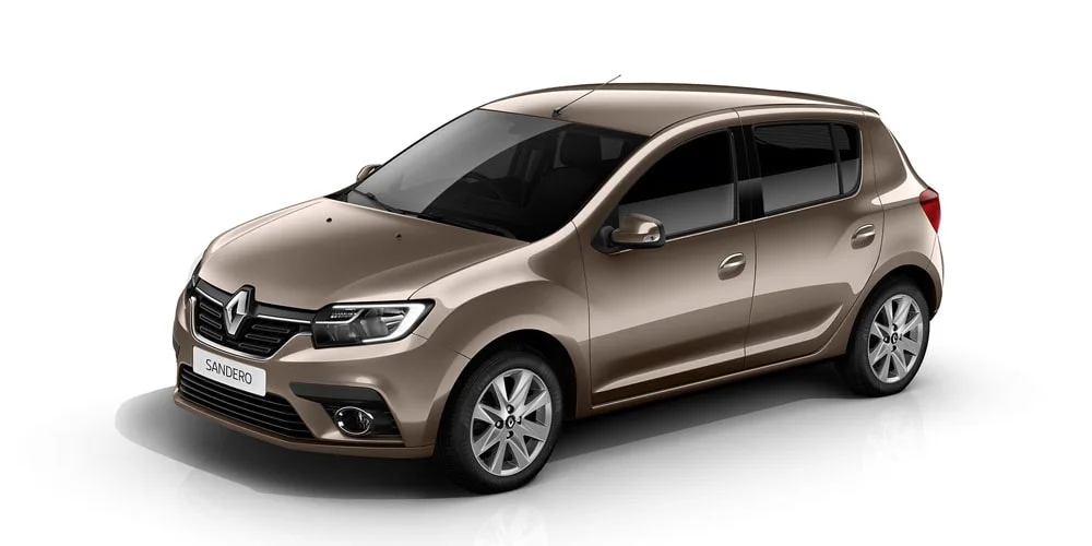 Фото Renault Sandero — вид спереди, фото 3. Передок в коричневом исполнении — крупная светотехника и выразительный бампер. Дневные ходовые огни включаются автоматически с запуском Renault Sandero — вид спереди, фото 3