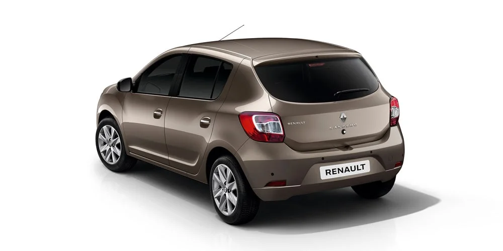 Фото Renault Sandero — вид сзади, фото 5. Корма в коричневом цвете: графика фонарей и пластика пятой двери. Насадки выхлопа или их имитация внизу бампера различают версии Renault Sandero — вид сзади, фото 5