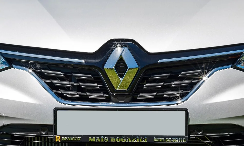 Фото Renault Taliant (2024) — решётка радиатора. Фирменный рисунок облицовки — визитная карточка марки Renault Taliant (2024) — решётка радиатора