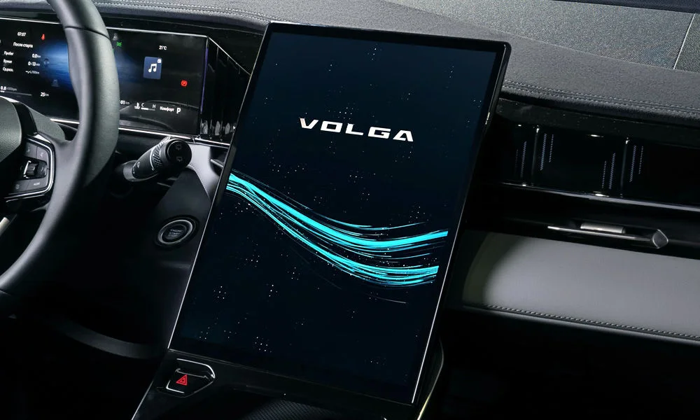 Фото Volga K40 (2024) — экран мультимедиа. Вертикальный экран мультимедиа — карты и списки помещаются целиком. Климат и обогревы часто управляются с этого экрана — привыкание занимает пару дней Volga K40 (2024) — экран мультимедиа