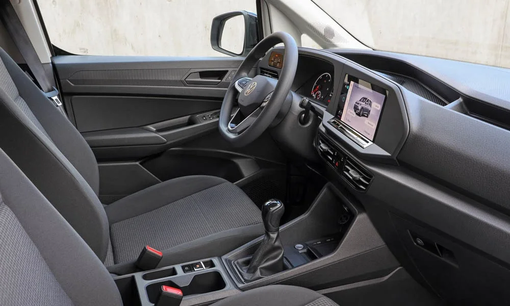 Фото Volkswagen Caddy — руль, фото 4. Обшивка обода и компоновка спиц крупным планом Volkswagen Caddy — руль, фото 4